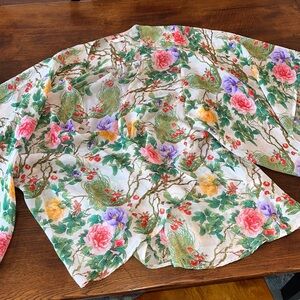 Sheer floral draping wrap with flowing sleeves